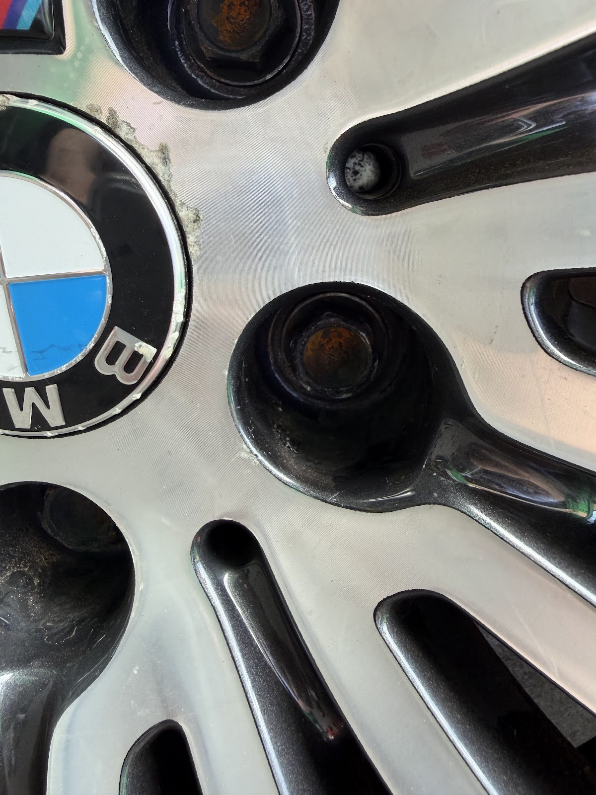 Gearbox and mechanical parts on the floor of the workshop at 1 Stop MOT & repairs ltd